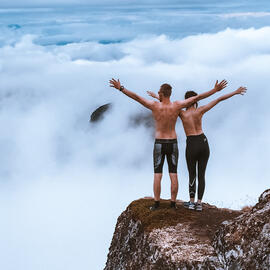 Photo by Tobias Bjørkli: https://www.pexels.com/photo/scenic-photo-of-people-standing-on-cliff-1819657/